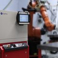 Brilliant high power diode laser LDF with a robot application in the background by Laserline diode lasers